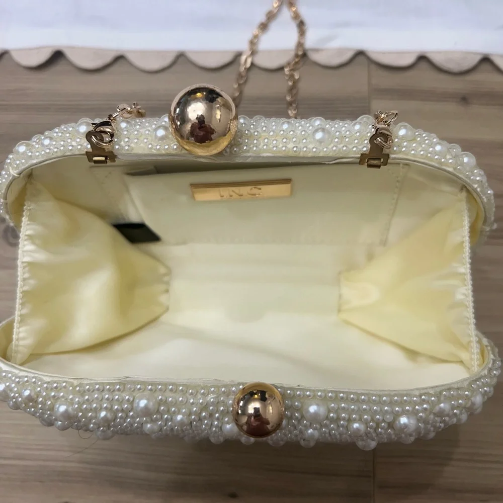 Elegant Pearl-Embellished Clutch